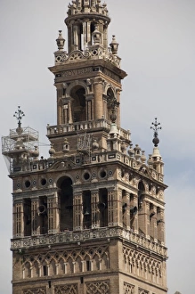 Seville Prints: Spain, Seville. Gothic Seville Cathedral. Detail of La Giralda Renaissance bell tower