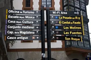 Basque Prints: Spanish language direction sign in the town of Llanes, Spain