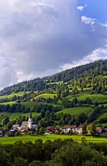 Murau Prints: St Lorenzo village in Murau Austria with beautiful green mountains in this alpine setting