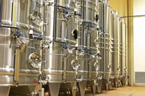 Warehouse Prints: Stacks of stainless steel fermentation vats in various sizes and with cooling systems