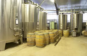 Images Dated 19th November 2005: stainless steel fermentation tanks and barriques Chateau Belingard Bergerac Dordogne