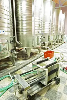 Storage Prints: Stainless steel fermentation tanks with cooling coils on the outside. Plate cellulose