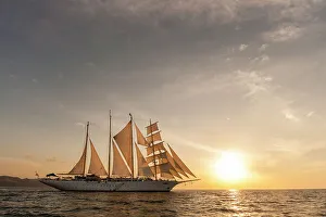 Away From It All Prints: The Star Flyer sailing cruise ship underway at sunset. Costa Rica. (Editorial Use Only)