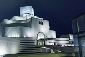 Architecture Collection: State of Qatar, Doha. Museum of Islamic Art, built 2008. Exterior at night