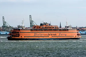 Staten Island Ferry in the harbor at New York City, New York, USA Staten Island Ferry in the harbor at New York City, New York, USA