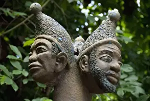 Statue of 3-headed voodoo deity in Sacred Forest of Kapasse, Ouidah, Benin