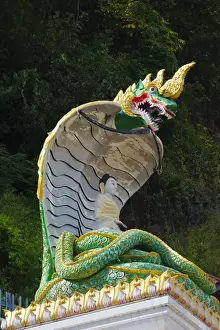 Burma Prints: Statue of Buddha meditating with his weight supported by the coils of a naga (snake)