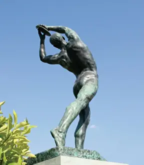 Sport Prints: Statue of Discobolus in front the Panathenaic Stadium (Kallimarmaron). K. Dimitriad, 1927