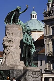 Statue of France Preseren, a Slovenian poet and national hero, and baroque-style Church of St