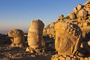 Statue of head at sunrise on the eastside of the mountain, Mt. Nemrut, Turkey