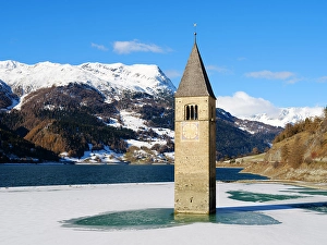 Steeple Prints: The steeple of village Alt-Graun in lake Reschensee