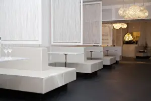 Futuristic Prints: Stockholm, Sweden - Bench style booth seating in a restaurant. The tables, seating