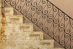 Stairway Prints: Stone staircase with ornate wrought iron balustrade. Greece, Crete, Chania