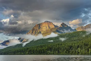 Images Dated 22nd May 2020: Stormy late afternoon light on Rainbow Peak at Bowman Lake in Glacier National Park