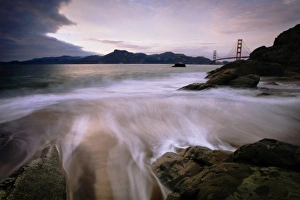 Marin Headland Prints: A stormy view of the Golden Gate Bridge from Baker Beach