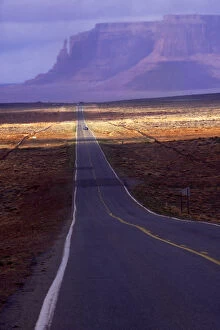 Images Dated 3rd November 2004: Straight road with desert waves heading for Monument Valley, Utah