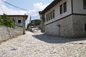 Citadel Prints: Street scene up towards the centre of the village from the entrance gate with old houses