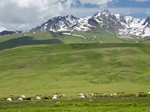 Summer pasture with traditional Yurts. The Suusamyr plain
