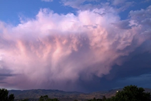 Summer storm cloud at sunset over the foothills near Boise, Idaho, USA