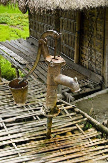 Images Dated 7th April 2009: Sumoimari Ghat, Majuli Island, Assam State, India water pump at the Village of Mising