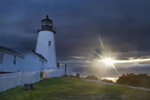 Images Dated 30th June 2011: Sun breaks through the clouds at Pemaquid Point Lighthouse in New Harbor, Maine, USA