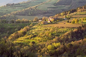 Images Dated 27th April 2004: Sunlight touches the stone buildings of a farm on the rolling hills near the rural