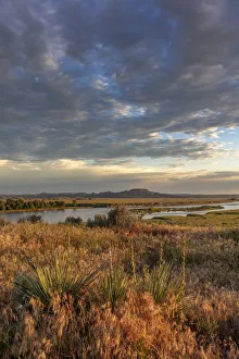 Badland Prints: Sunrise clouds over the Yellowstone River at the confluence with the Powder River near Terry