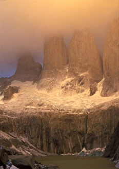 Images Dated 12th August 2004: Sunrise glow with clouds at Torres del Paine in the Patagonia region of Chile