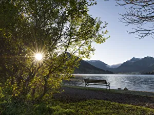 Foothill Prints: Sunrise at lake and village Schliersee in the Bavarian Alps during autumn, Bavaria