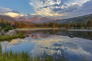 Sunrise light on Hallett Peak and Flattop Mountain above Sprague Lake in Rocky Mountain