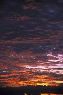 Sea Scape Prints: Sunset over clouds