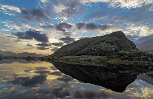 Images Dated 2023: Sunset clouds reflect in Upper Lake Killarney in Killarney National Park, Ireland