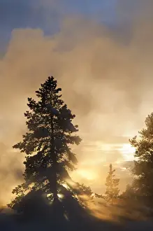 Thermal Prints: Sunset colors the steam above Leather Pool in the Lower Geyser Basin in Yellowstone