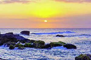 One Person Prints: Sunset on the Indian Ocean with lava rock islets in the foreground