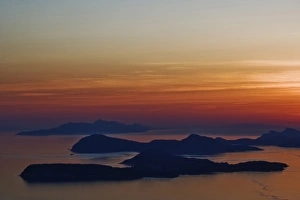 Images Dated 12th May 2007: Sunset over islands in the Adriatic Sea off Dubrovnik, Croatia, a UNESCO World Heritage