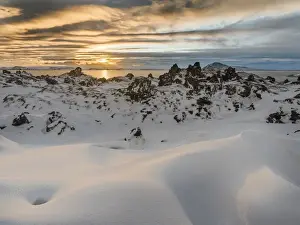 Images Dated 26th February 2015: Sunset over lake Myvatn in the highlands of Iceland during winter with lava rock formations