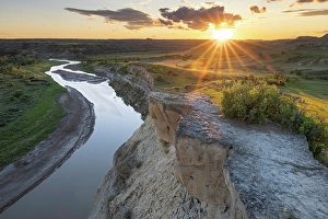 Prints of Sunset over the Little Missouri River from Wind Canyon Overlook in Theodore Roosevelt National Park, North Dakota, USA. (Editorial Use Only) Images Dated 2024 September: Sunset over the Little Missouri River from Wind Canyon Overlook in Theodore Roosevelt National Park