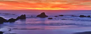 Sunset over the Pacific Ocean from Seal Rock along the Oregon Coast