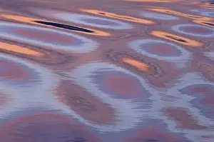 Images Dated 11th September 2007: Sunset reflections; the movement of the water caused by the ship created this amazing mix of light