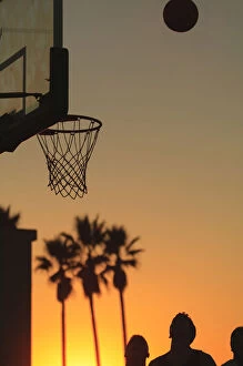 Sunset scenes near Venice Beach, Southern CA, USA. Outdoor basketball court