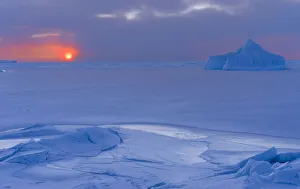 Images Dated 9th November 2020: Sunset at the shore of frozen Disko Bay during winter, West Greenland, Denmark