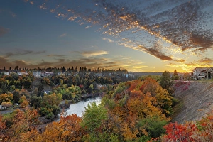 Prints of Sunset skies over autumn color along the Spokane River in Spokane, Washington State, USA Images Dated 2024 April: Sunset skies over autumn color along the Spokane River in Spokane, Washington State, USA