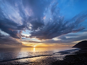 Prints of Sunset sky reflected on water on beach. Whidbey Island, Washington State Images Dated 2024 September: Sunset sky reflected on water on beach. Whidbey Island, Washington State