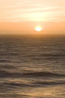 Jim Goldstein Prints: Sunset over the turbulent surf of the Pacific Ocean - San Francisco, California