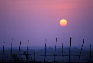 Sunsets over the fields surrounding a Karo village in the Omo river area, Ethiopia