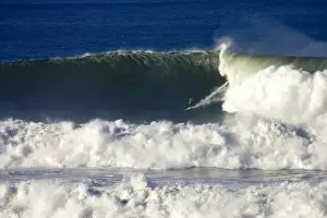Surfing Prints: A surfer braves the gigantic surf at the Mavericks Big Wave Surf Competition in Northern