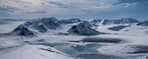 Spitzbergen Prints: Svalbard, Norway. Ski track in a panoramic landscape of mountains, glacier and water