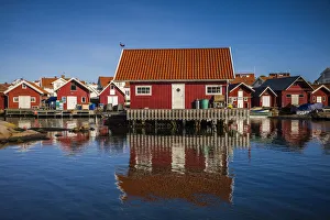 Neighborhood Prints: Sweden, Bohuslan, Kungshamn, red fishing shacks in the Fisketangen