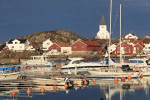 Bohuslan Prints: Sweden, Bohuslan, Tjorn. Views over Skarhamn village rooftops, town, church, harbor
