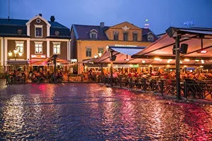 Sweden, Linkoping, cafes and bars on Stora target square, dusk